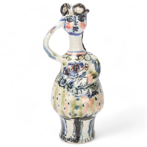 343 - A studio ceramic candle holder in the form of a woman, monograms to base, height 28cm