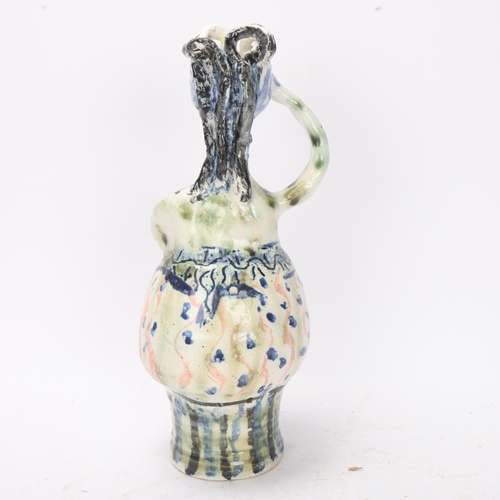 343 - A studio ceramic candle holder in the form of a woman, monograms to base, height 28cm