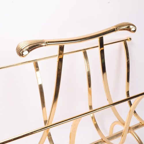 350 - A vintage Hollywood Regency style magazine rack, gilt metal with scrolled handles, height 50cm, leng... 