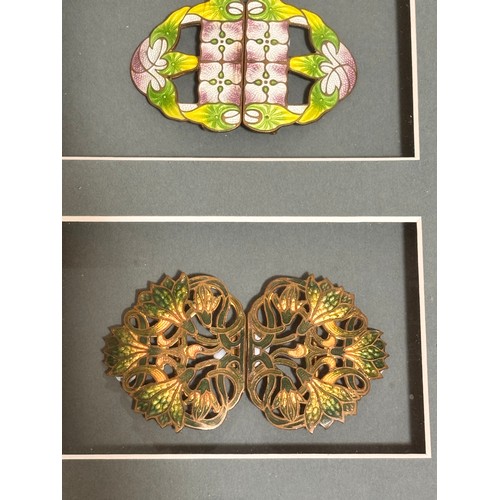 125 - 3 Art Nouveau coloured enamel buckles, mounted in good quality modern frame, overall frame dimension... 