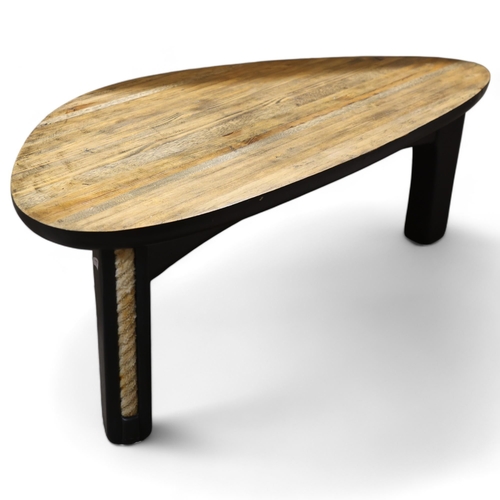 333 - TERRY WARREN, an ebonised driftwood coffee table, with polished top and rope inserts to legs, signed... 