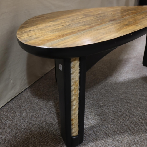 333 - TERRY WARREN, an ebonised driftwood coffee table, with polished top and rope inserts to legs, signed... 