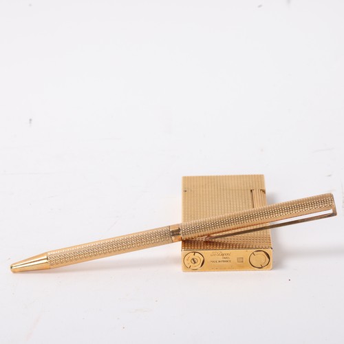 648 - SJ Dupont, a 1980s' gold plated lighter and Ballpoint pen, with original fitted boxes and guarantee ... 