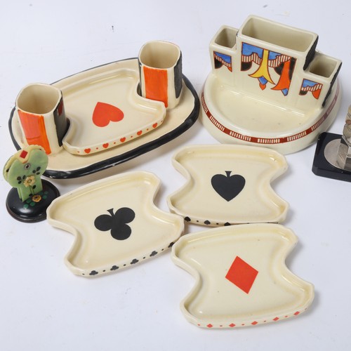 90 - A group of Art Deco novelty items, comprising Royal Doulton Bridge set on stand, Bakelite Bridge mar... 