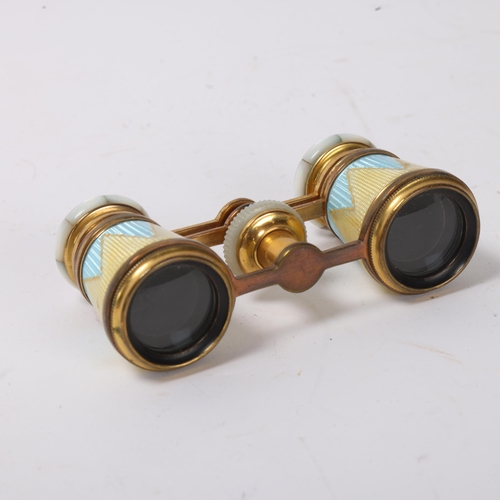 864 - A pair of 19th century French opera glasses, gilt-brass with coloured enamel and mother-of-pearl, wi... 