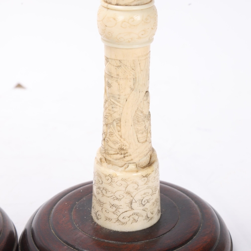 874 - Pair of 19th century Japanese bone multi-section candlesticks on wood bases, height 40cm, 1 A/F