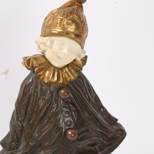 880 - Demetre Chiparus (1886 - 1947), girl in a Pierrot clown costume, parcel-gilt bronze and ivory on ony... 