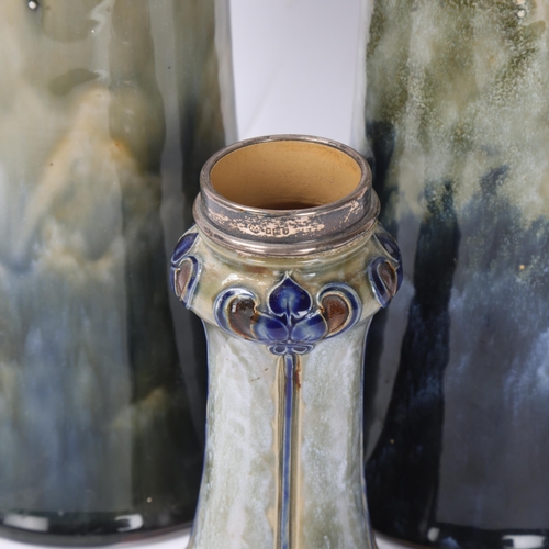 884 - Pair of Royal Doulton stoneware cylinder vases, height 33cm, and Art Nouveau Doulton vase with silve... 