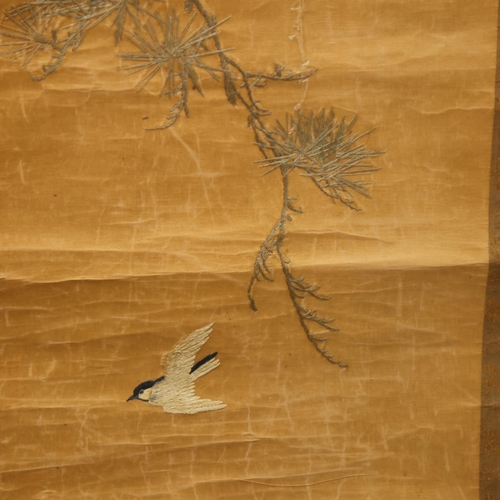 887 - A Chinese silk embroidered scroll