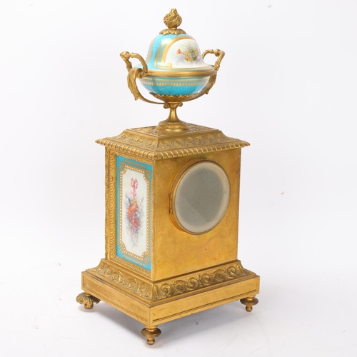 888 - A fine 19th century gilt-bronze and porcelain 8-day mantel clock, with hand painted panels depicting... 