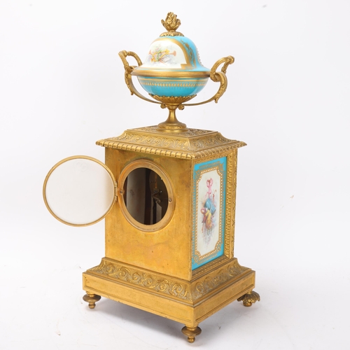 888 - A fine 19th century gilt-bronze and porcelain 8-day mantel clock, with hand painted panels depicting... 