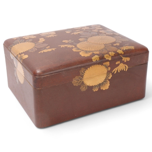 715 - A large Japanese gilded and lacquered box, Meiji Period circa 1890 - 1900, raised gilded blossom dec... 