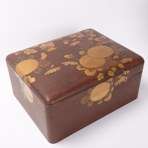 715 - A large Japanese gilded and lacquered box, Meiji Period circa 1890 - 1900, raised gilded blossom dec... 