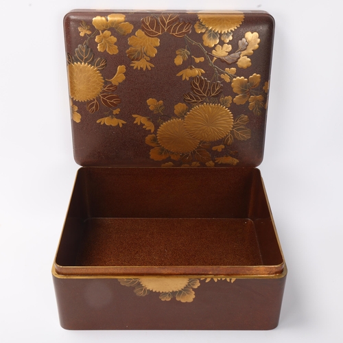 715 - A large Japanese gilded and lacquered box, Meiji Period circa 1890 - 1900, raised gilded blossom dec... 