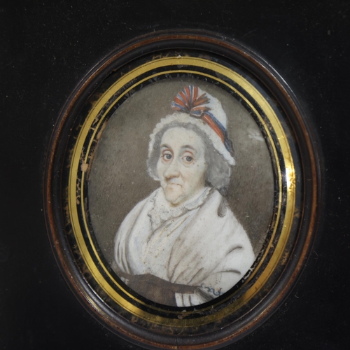 726 - Miniature portrait of a woman, watercolour on ivory, unsigned, early 19th century, framed, overall f... 