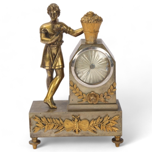 731 - A French parcel-gilt bronze mounted 8-day mantel clock surmounted by an angel figure, spring movemen... 