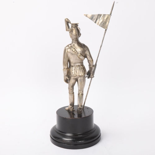 736 - A 19th century electroplate figure of a Standard Bearer from the 12th Lancers, ebonised base with mi... 