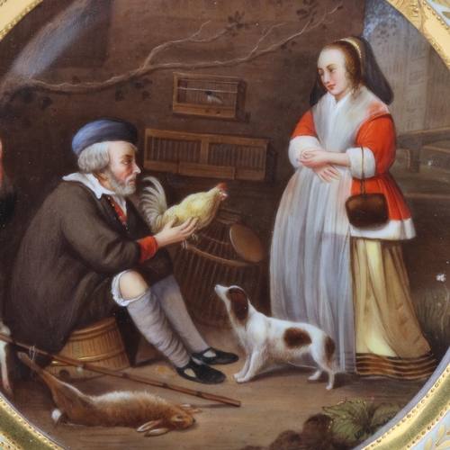 739 - A Vienna porcelain plate depicting a bird handler, gilded border, diameter 25.5cm