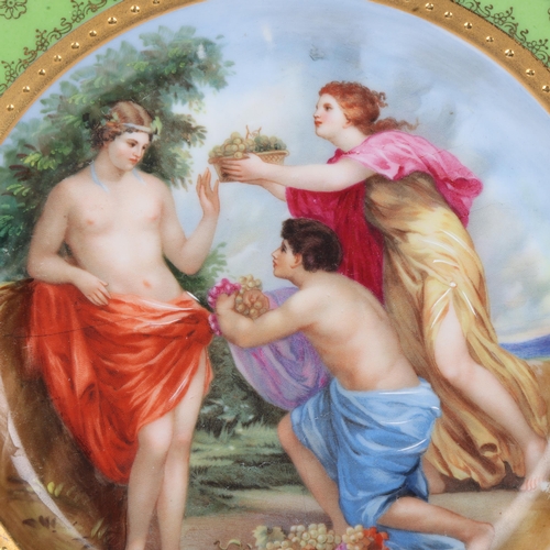 740 - A Vienna porcelain plate depicting 3 Classical figures, gilded border, diameter 24cm