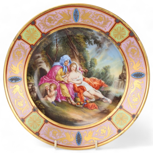 743 - A Vienna porcelain plate depicting Venus and Armida, gilded border, diameter 24.5cm