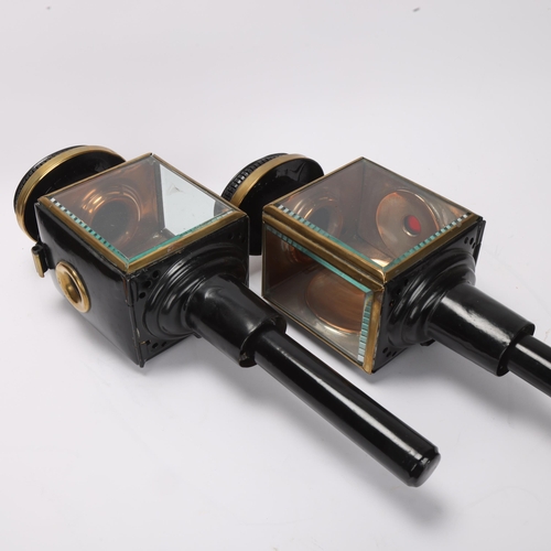 748 - A pair of 19th century brass-mounted coach lamps, with bevel-glass panels, height 45cm