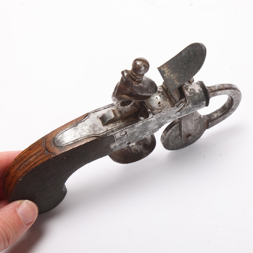 762 - An Antique flintlock powder tester, the lock panels engraved with animals and carved wood handle, le... 