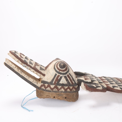 776 - An African carved and painted wood Tribal crocodile mask, length approx 115cm