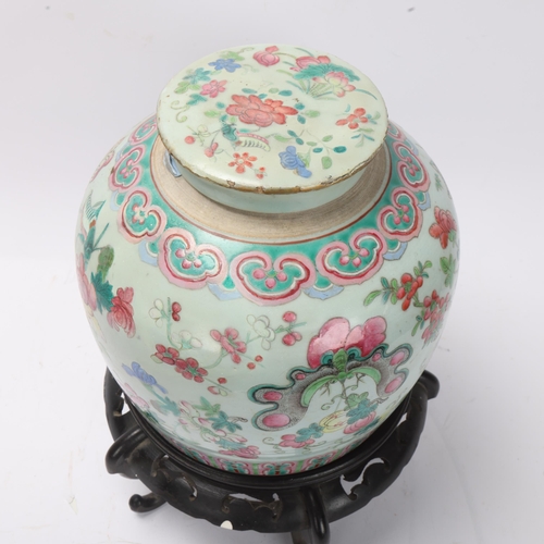 784 - A Chinese 19th century famille rose porcelain jar and cover, with painted enamel insects and flowers... 