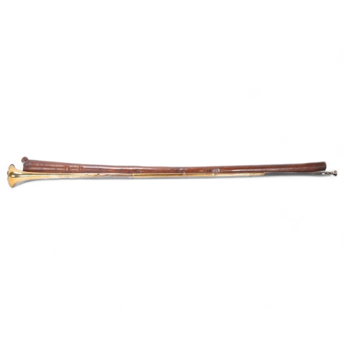 797 - A brass coaching horn, by Army & Navy of London, length 145cm, in leather holder