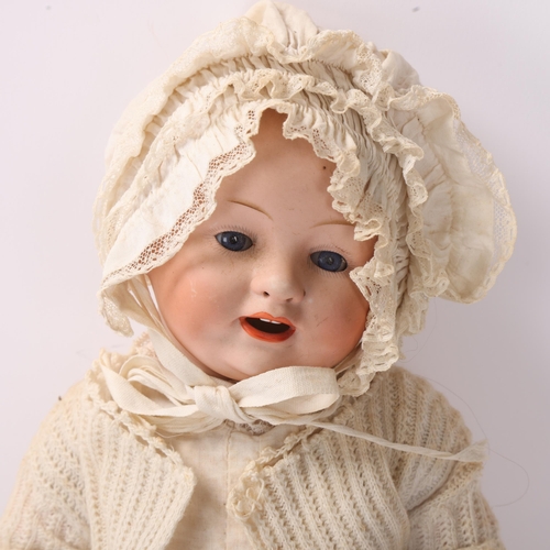 801 - A porcelain-headed baby doll, by Schmidt, Franz & Co, Georgenthal, mould no. 1272, composition limbs... 