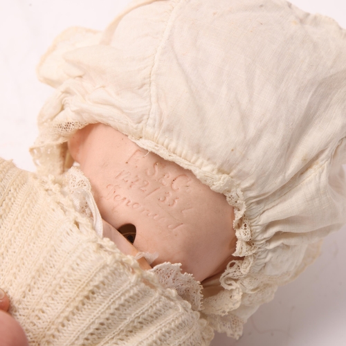 801 - A porcelain-headed baby doll, by Schmidt, Franz & Co, Georgenthal, mould no. 1272, composition limbs... 