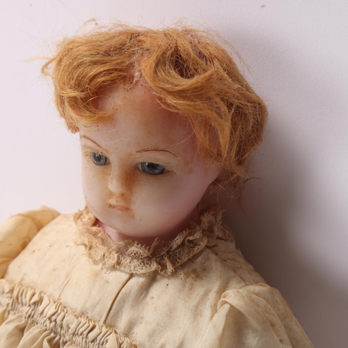 802 - Victorian wax doll with wax limbs and original clothes, length 39cm