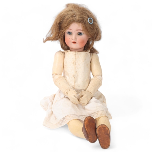 804 - A bisque porcelain-headed girl doll, made by Kammer & Reinhardt using Simon & Halbig bisque head, no... 