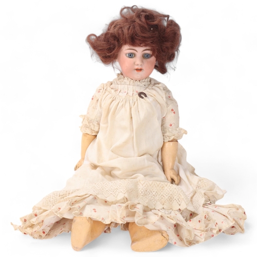 805 - A bisque porcelain-headed girl doll, by Simon & Halbig, with dimple chin, length 46cm