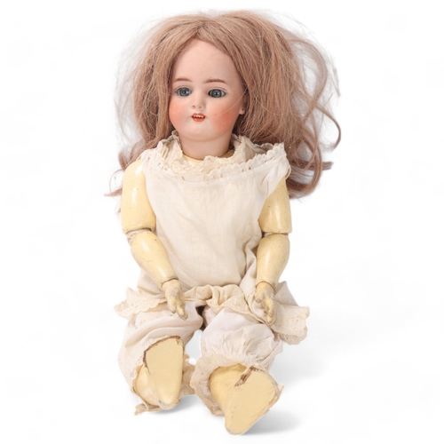 806 - A bisque porcelain-headed girl doll, by Simon & Halbig, length 42cm