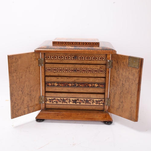 827 - A fine quality 19th century Tunbridge Ware table cabinet, the lid depicting a view of the Solar and ... 