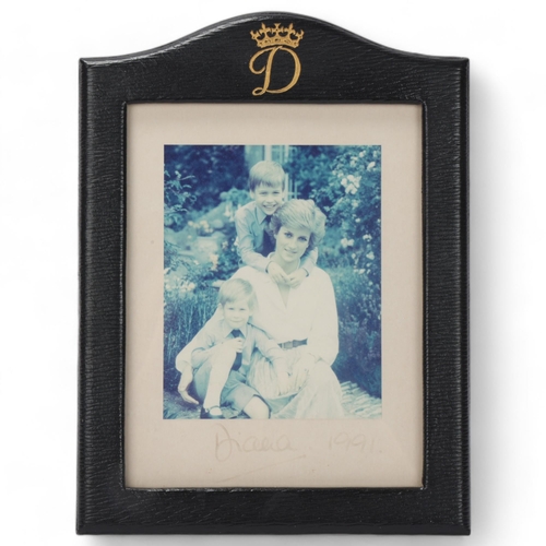 700 - Diana, Princess of Wales, photograph portrait of Diana with Princes William and Harry, signed in pen... 