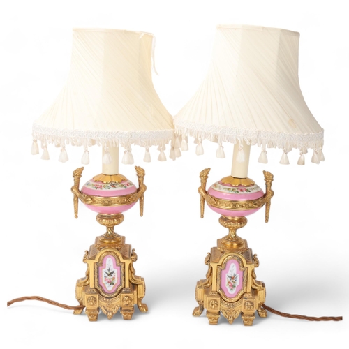 702 - Pair of French ormolu and porcelain table lamps, circa 1900, with hand painted panels depicting bird... 