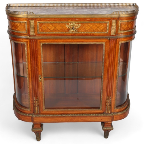 704 - A fine quality French walnut and marquetry inlaid vitrine cabinet, circa 1900, the marble top having... 