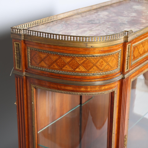 704 - A fine quality French walnut and marquetry inlaid vitrine cabinet, circa 1900, the marble top having... 