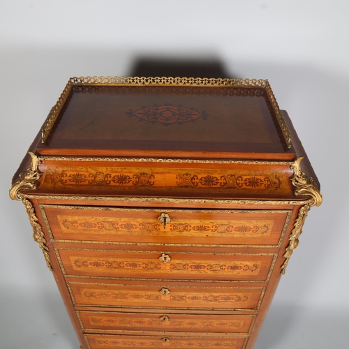 705 - An ornate French mahogany and marquetry inlaid writing cabinet, circa 1900, brass galleried top with... 