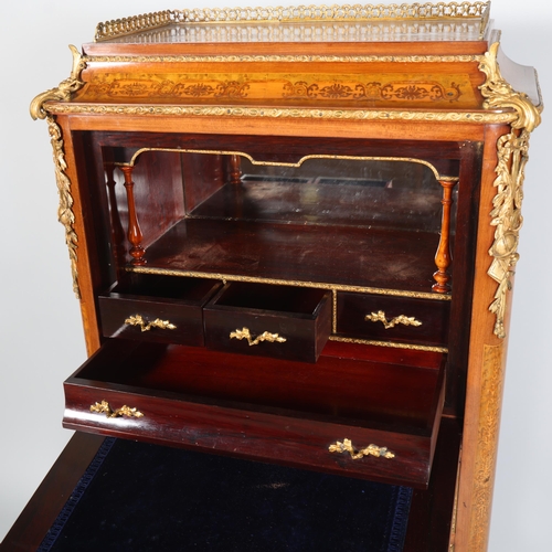 705 - An ornate French mahogany and marquetry inlaid writing cabinet, circa 1900, brass galleried top with... 