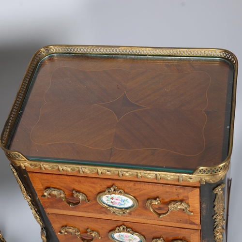 710 - A pair of French walnut 2-drawer bedside chests, inset porcelain plaques to the drawer fronts, brass... 