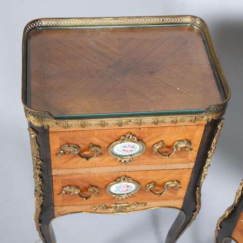 710 - A pair of French walnut 2-drawer bedside chests, inset porcelain plaques to the drawer fronts, brass... 