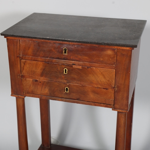 711 - Georges Jacob of Paris, French Empire mahogany 3-drawer side table, circa 1800 - 1810, with black ma... 