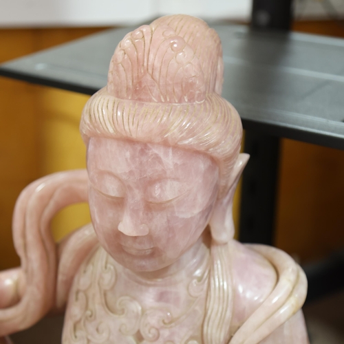 851 - A massive Chinese rose quartz figure of Guanyin holding a Rui sceptre, height 71cm