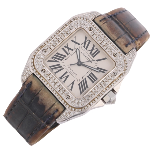 2002 - CARTIER - a stainless steel and diamond Santos 100 automatic wristwatch, ref. 2878, silvered dial wi... 