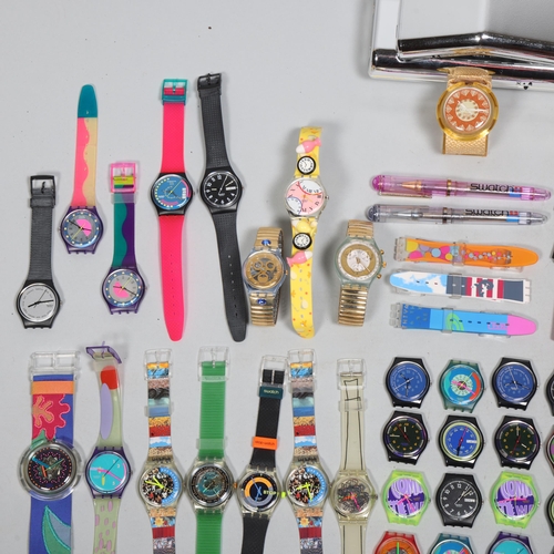 2032 - SWATCH - a large quantity of ex-Swatch buyer's quartz wristwatches, accessories and ephemera, includ... 