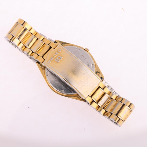 2043 - SEIKO - a gold plated stainless steel SQ quartz bracelet watch, ref. 5H23-8A00, champagne dial with ... 