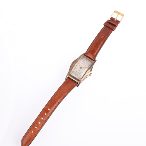 2044 - BULOVA - an American gold plated stainless steel mechanical wristwatch, circa 1940s, silvered dial w... 